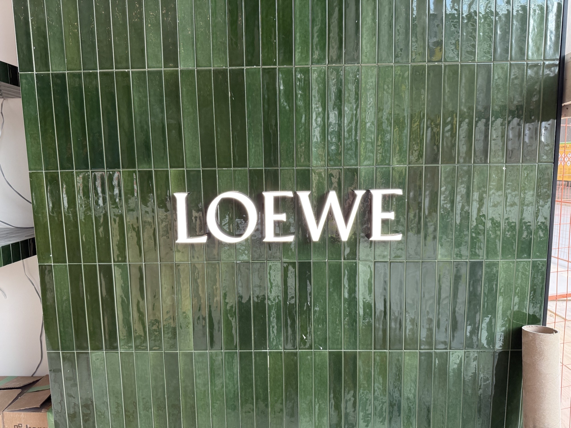Loewe · Oakridge Park · Green tiled storefront detail